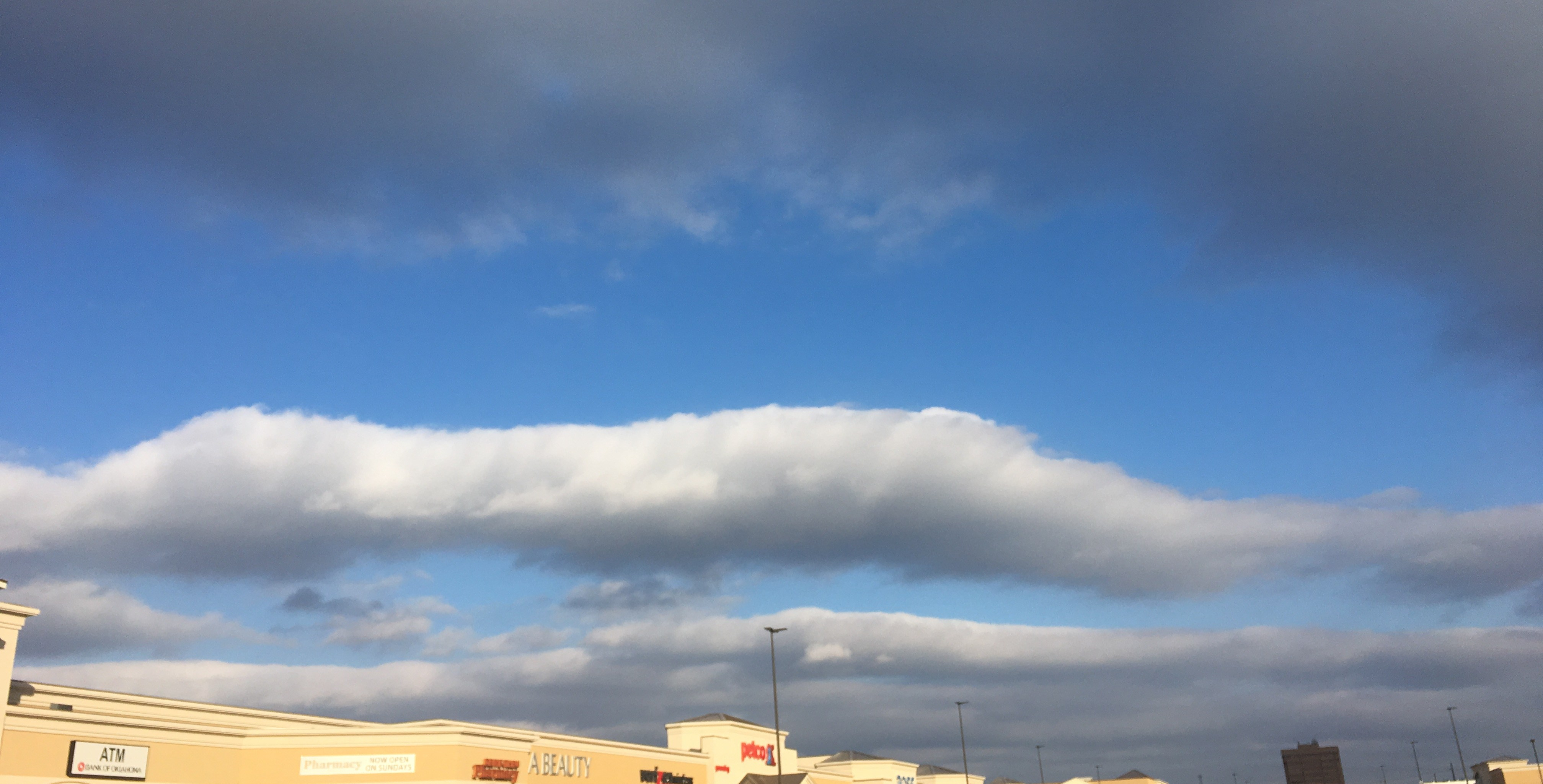 [Clouds over a shopping centre]